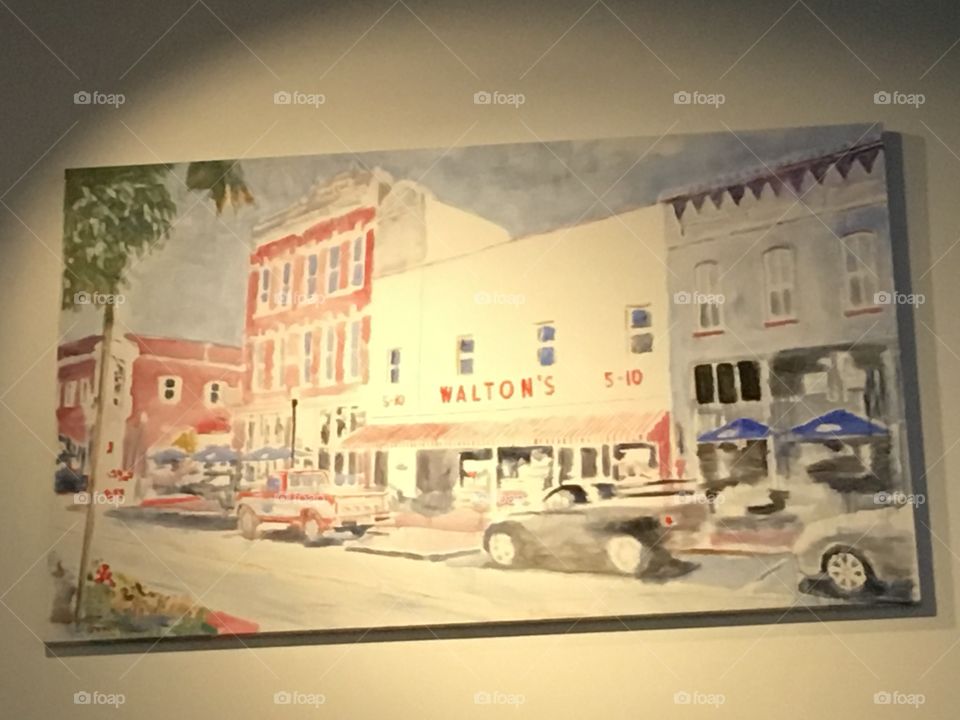 Picture of Walton’s 5&10 and the stores around it at the time it was new. The way it was.