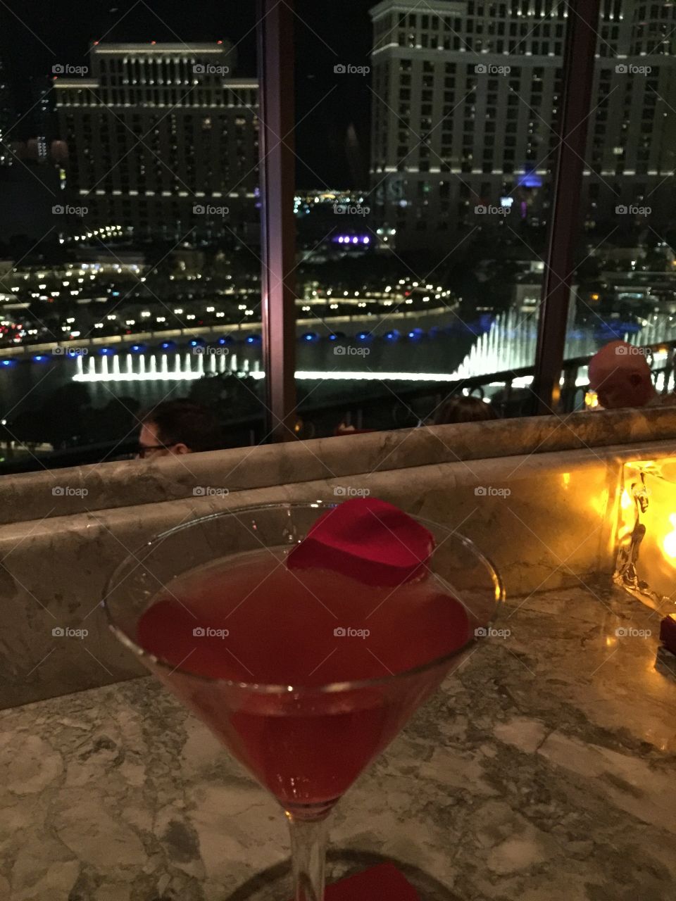 Rose petal martini overlooking the fountains of the Bellagio