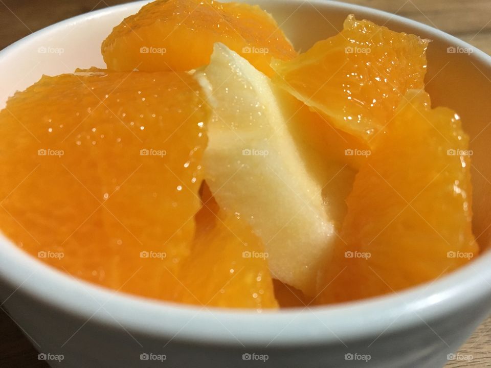 Slices of orange and apple.