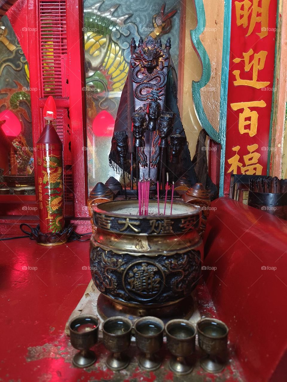 Chinese incense burner in a Chinese temple, closeup of photo