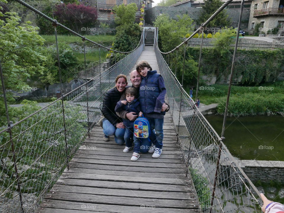 Portrait of a family on bridge