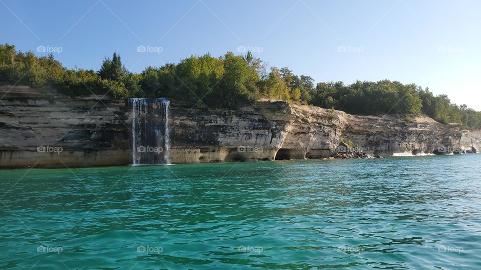 Water falling into Lake Superior at Pictured Rocks