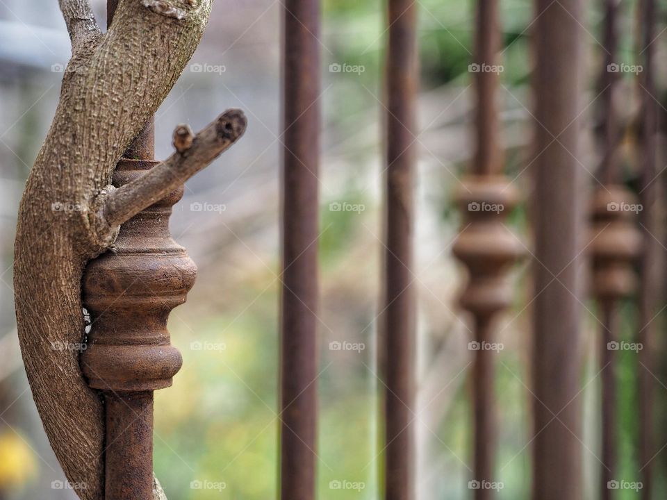 Close up of a rusty wrought iron balcony