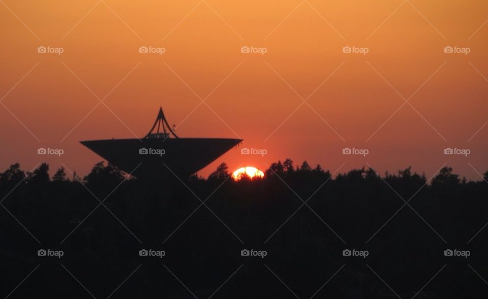 Watertower in sunset