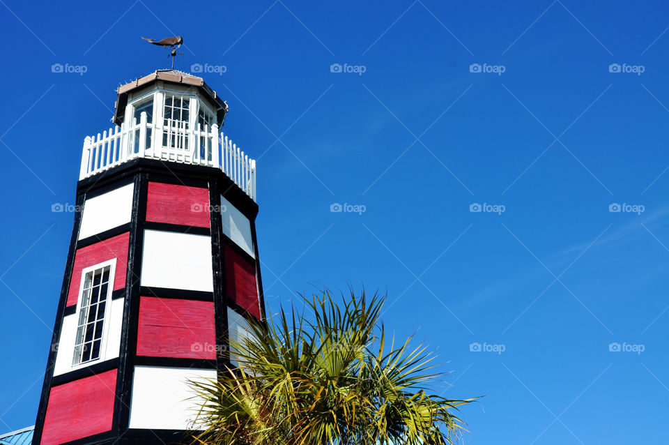 Red and white lighthouse.