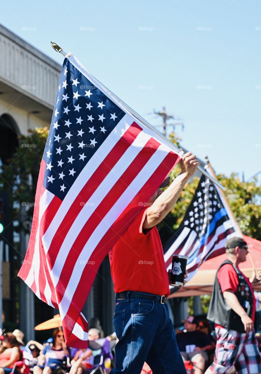 The flags during the 4th of July annual parade In Modesto, California 2019.