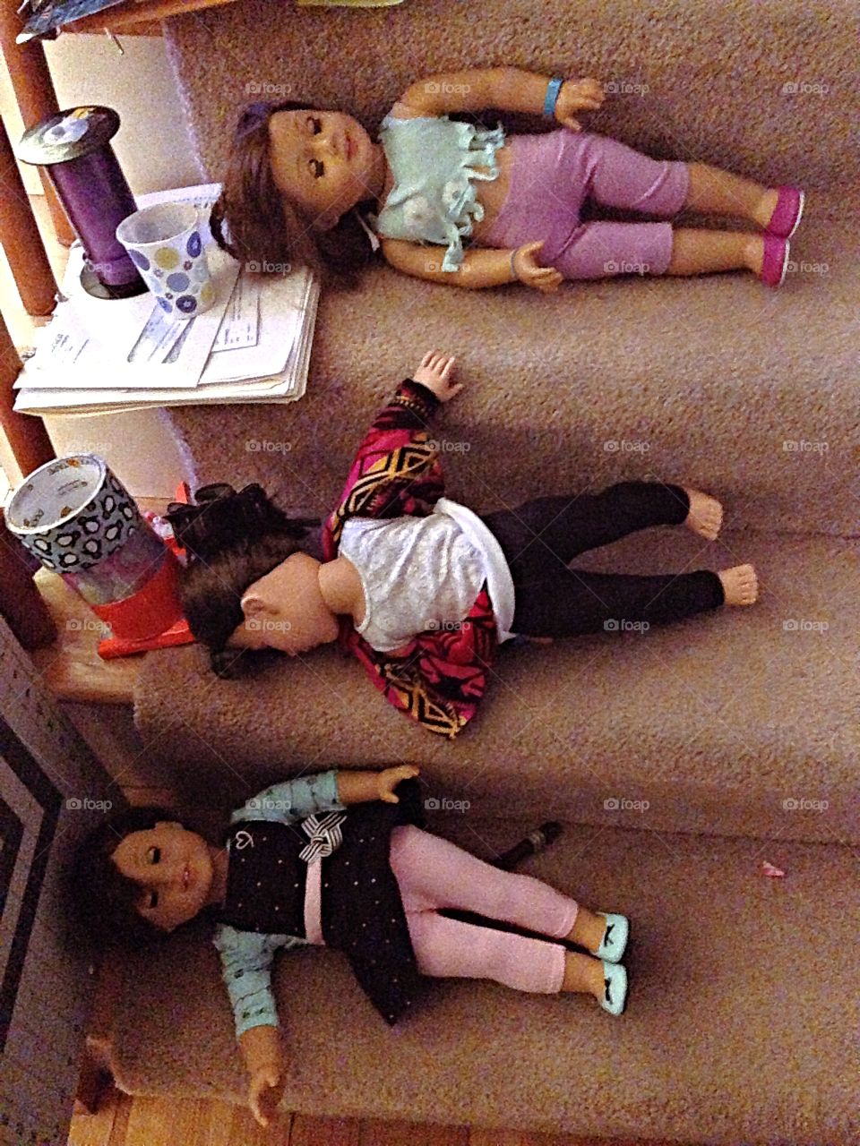 Passed out. Perhaps the dolls indulged a bit too much?