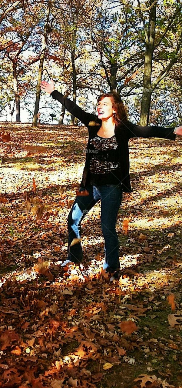 playing in the  leaves