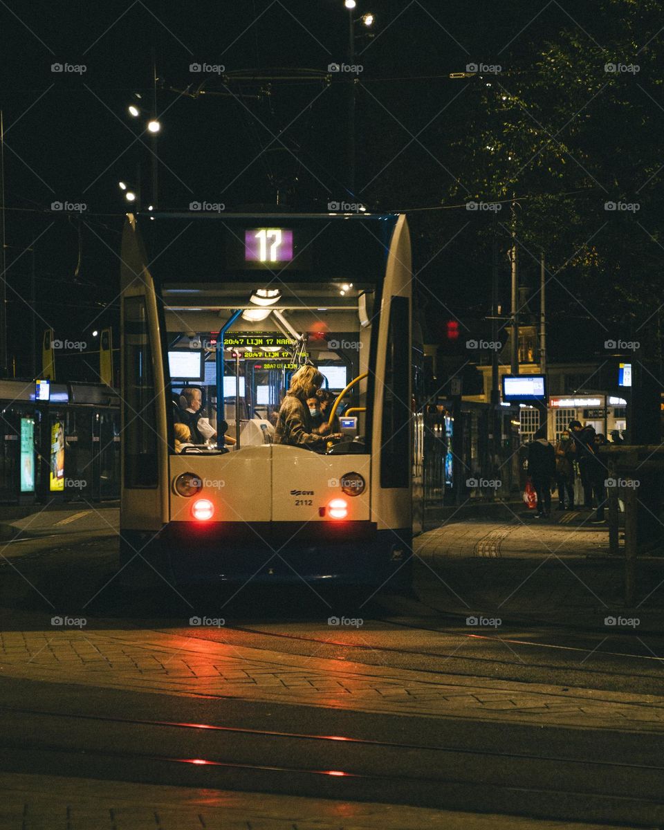 Woman getting off the tram