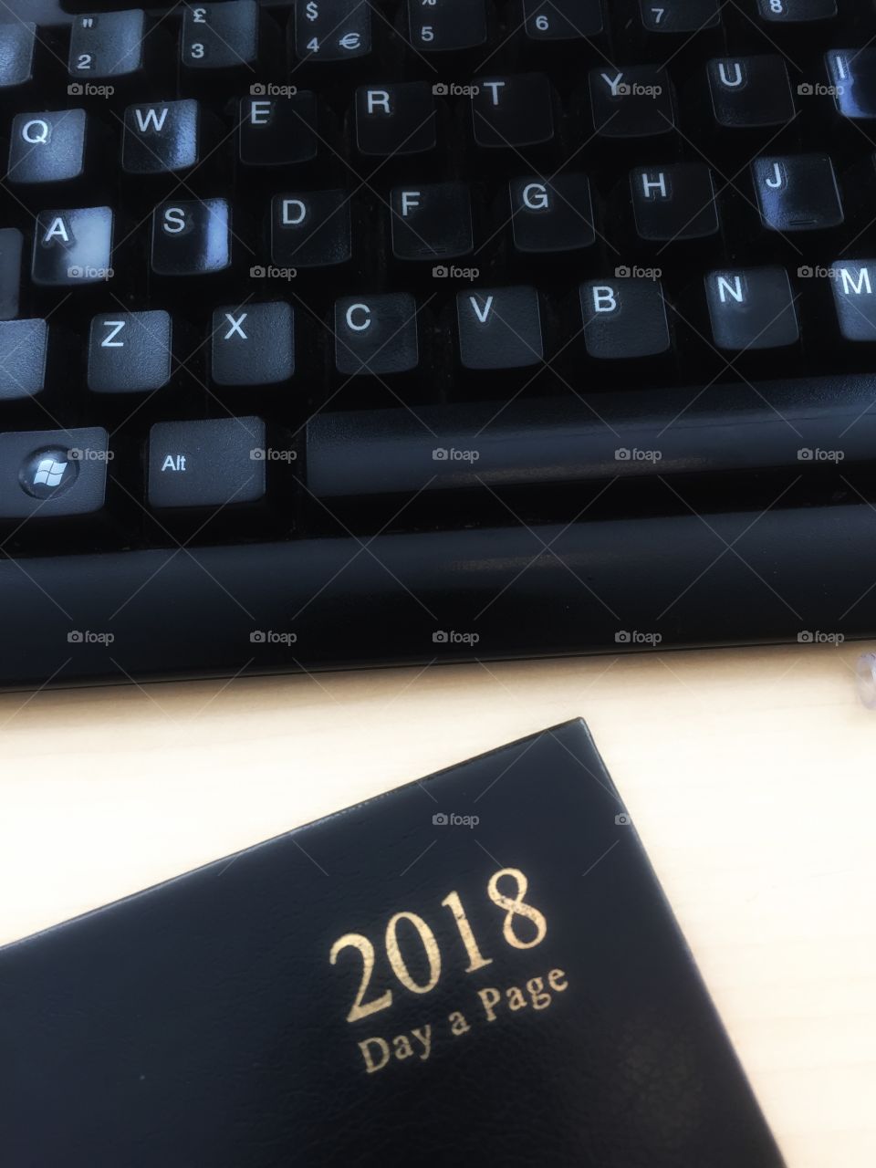 Computer keyboard and diary book 2018 