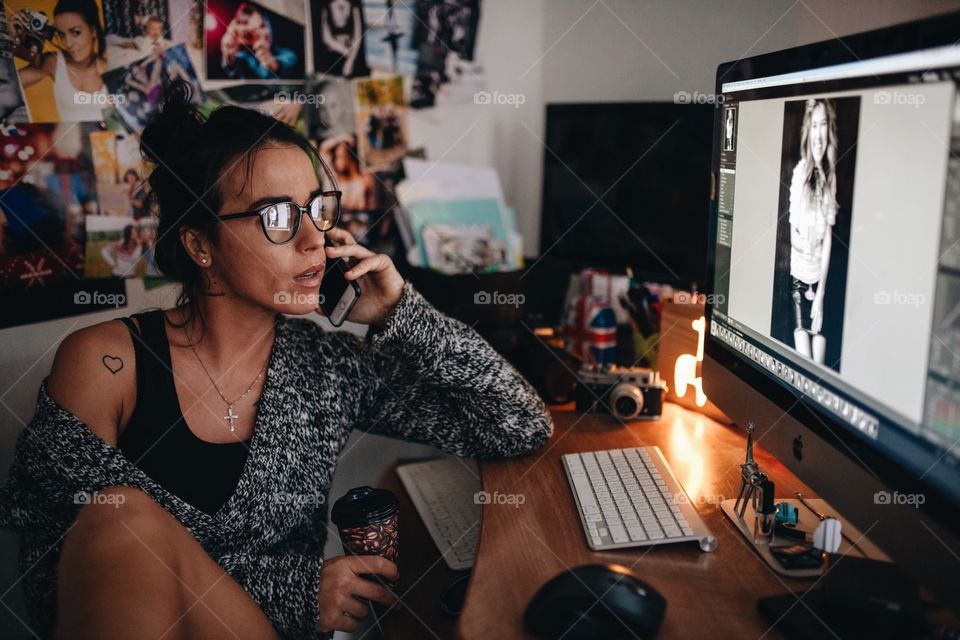 girl designer working at a computer on a project