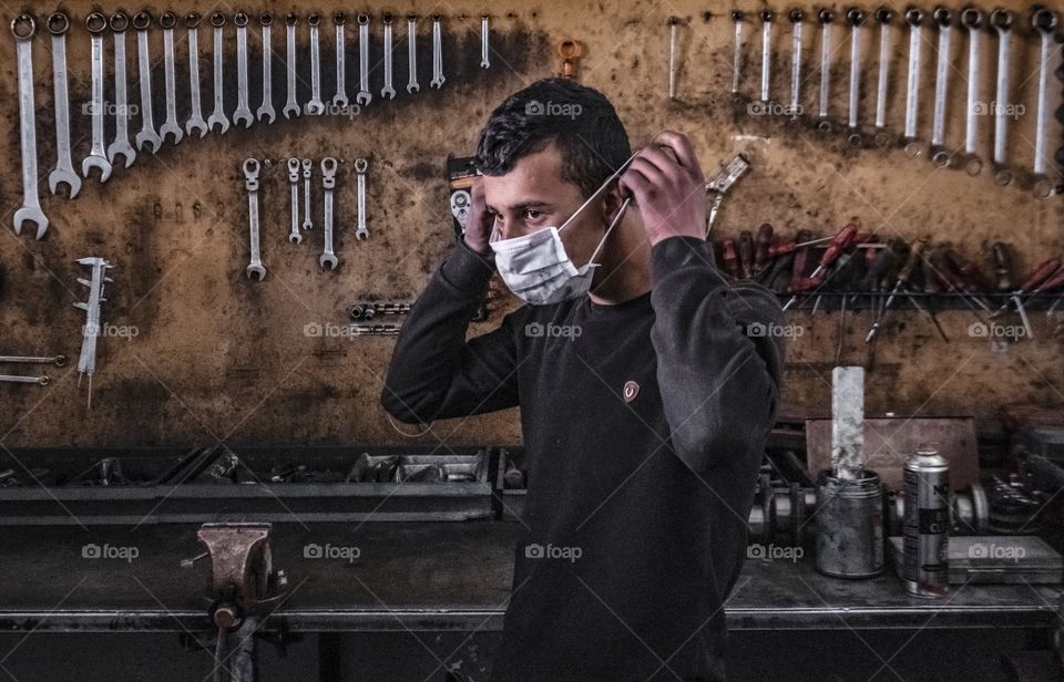 Young Man with metal equipment