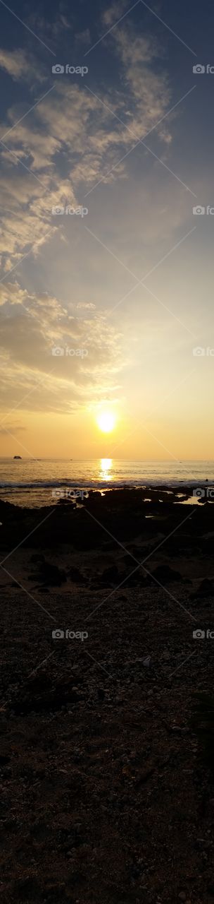 Hawaiian sunset at Magic Sands beach on the Big Island.