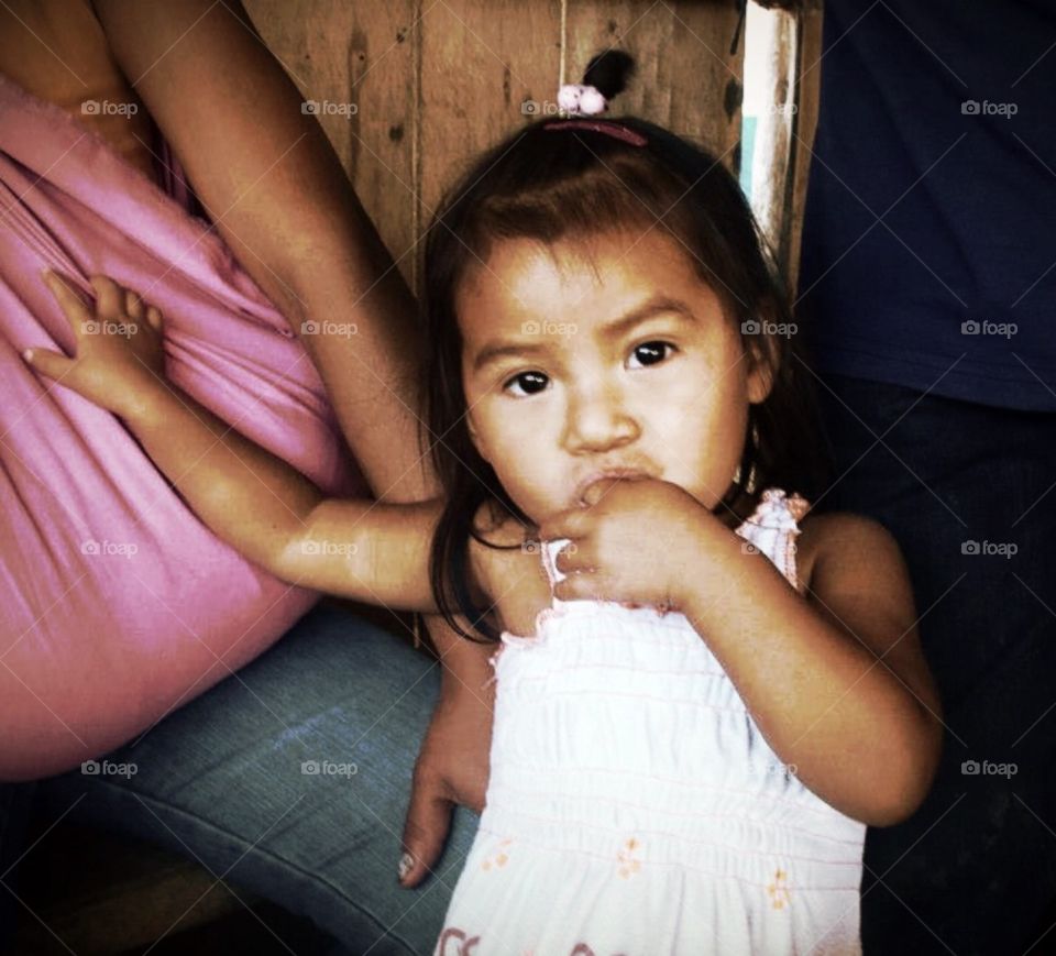 A look of innocence- child receiving healthcare in Ecuador 