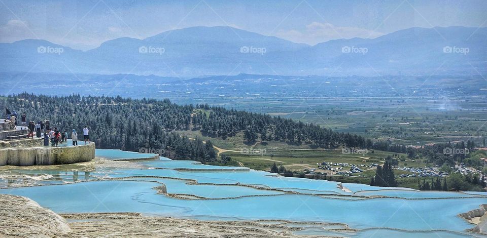 view of the valley from the beautiful healing travertine pools of Pumalakke
