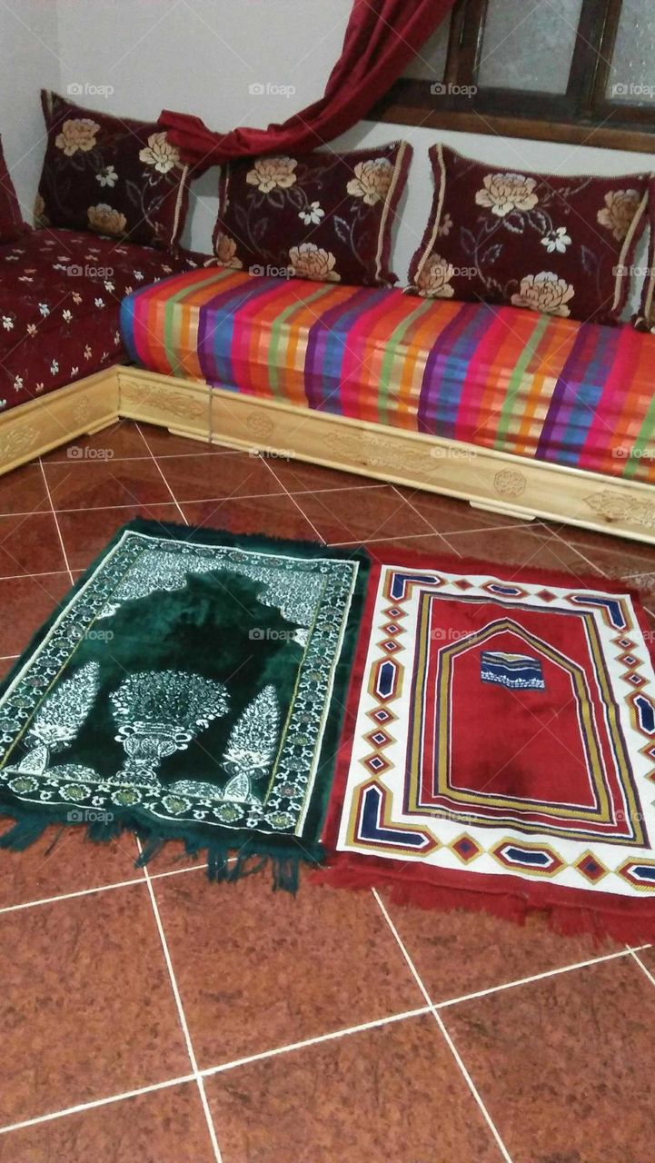 Living room and carpets for prayer.