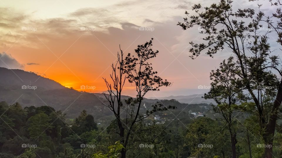 sun set with mountain