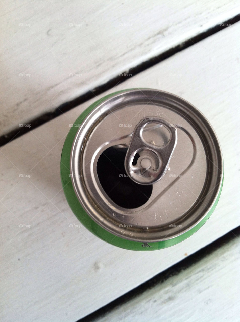 Can sitting on coffee table, birds eye view