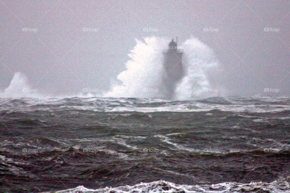 Whaleback lighthouse in a storm