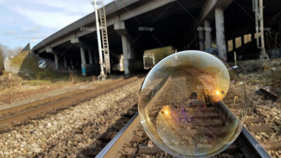 Close-up of bubble on railroad track