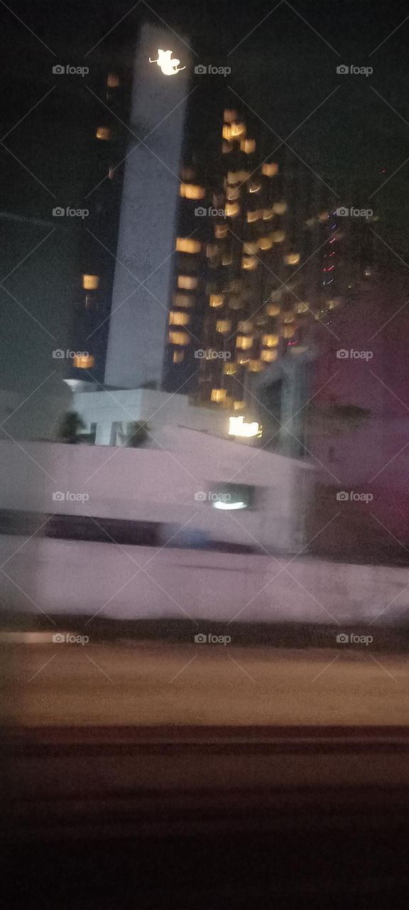 Twinkling windows , the beauty of evening light. Bask in the beauty of evening light with the view of light twinkling from these windows at night