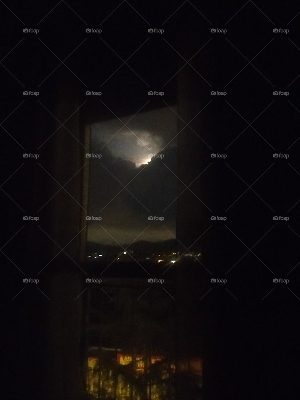 Moonlight between clouds, seen through my Window