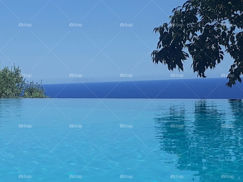 Swimming pool, sea and sky