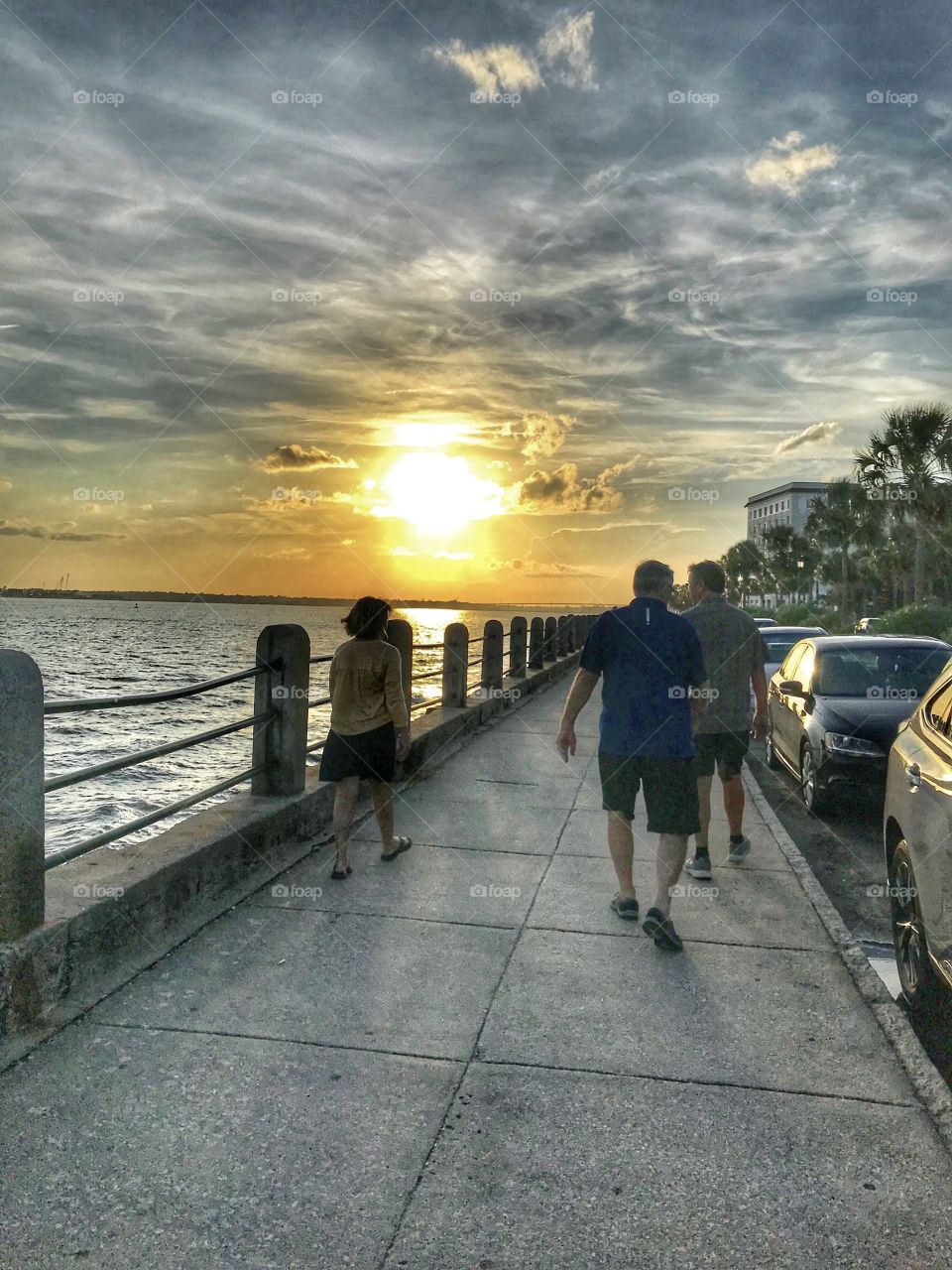 Walking along The Battery at sunset 