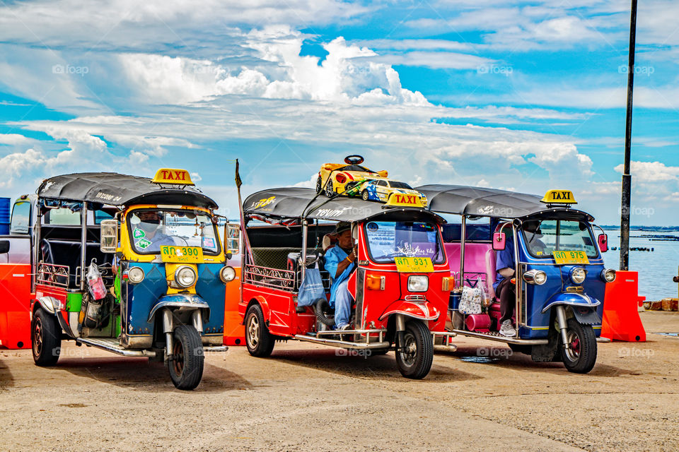 Multi coloured Thai TuK Tuk Taxi Vehicle in Siracha District Chonburi Thailand Southeast Asia