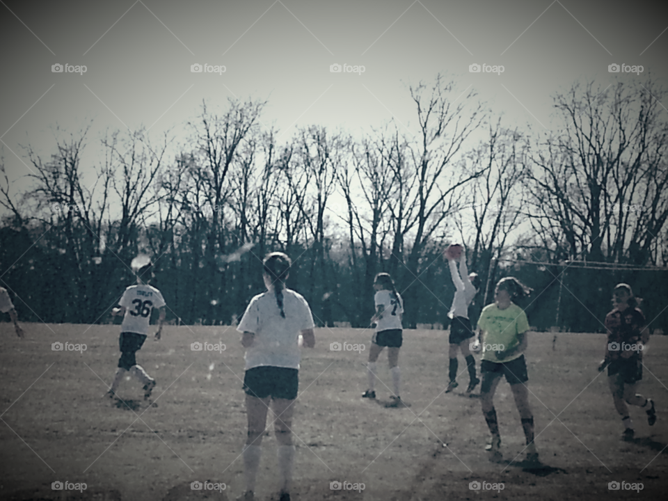  soccer practice in a field. people enjoying spring mission