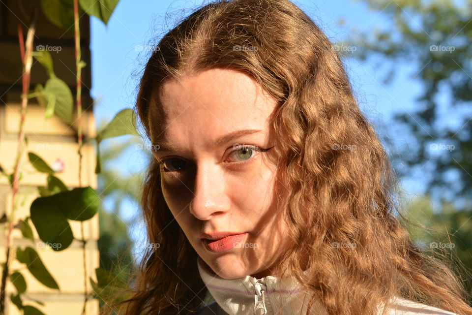 girl beautiful portrait close up in the sunlight