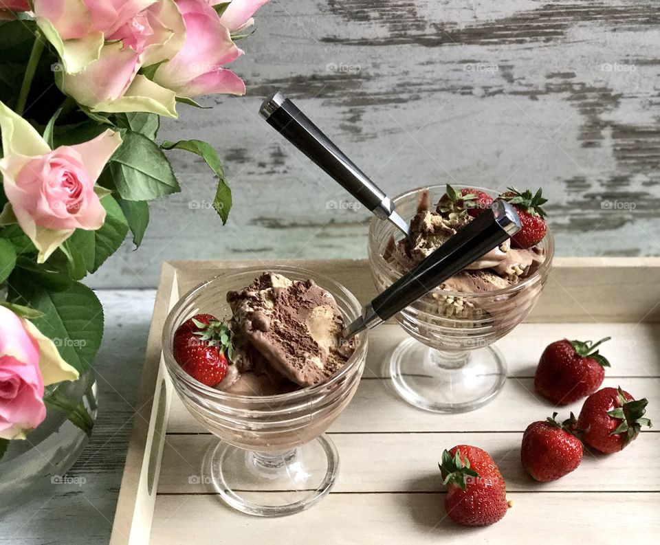 Ice creams on wooden tray