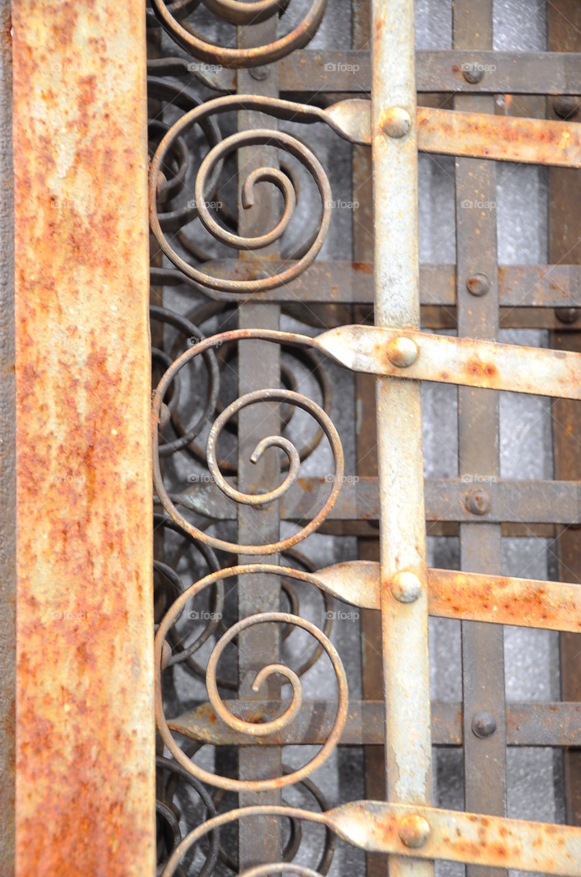 Repeating patterns of rusty metal, peeling patina on rusty iron