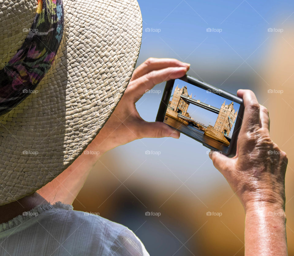 Phone. Camera phone Tourist taking a picture with a smartphone cell phone mobile phone camera 