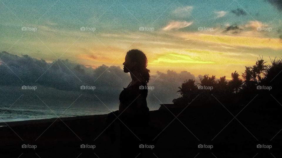 After a pretty darn exiting day,being washed a couple of times from the heavy plungers crushing on shore...she finally made peace with the ocean in sweet Bali..