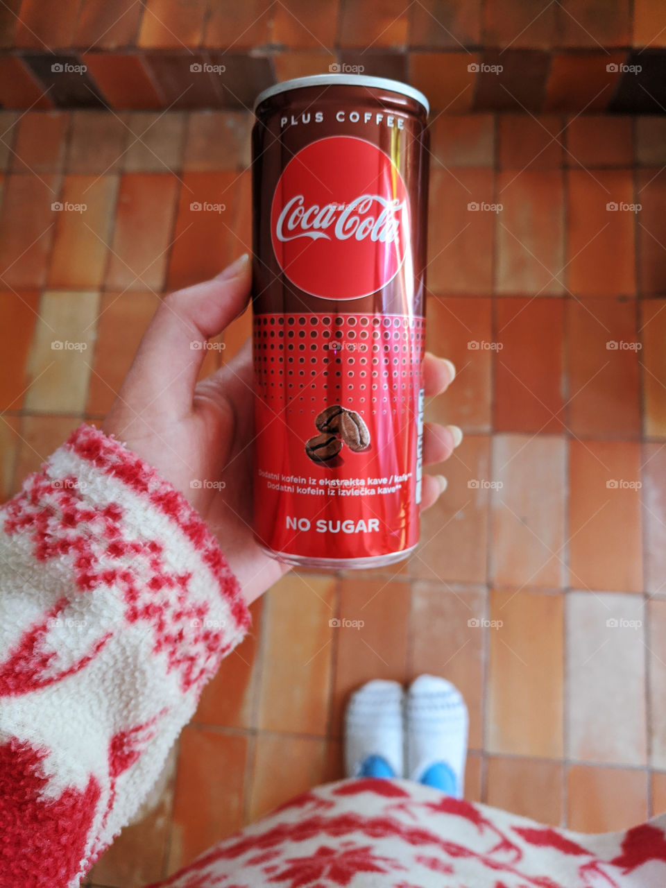 Red can of Coca Cola without sugar close up. Top view. Flatlay.