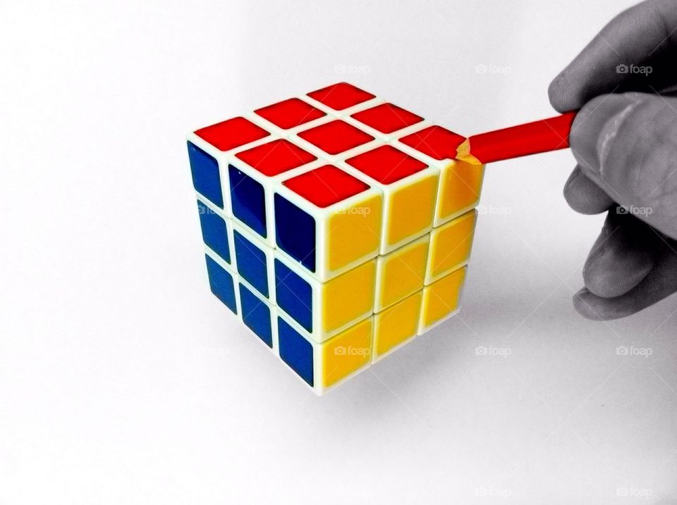 Painting rubik on white paper