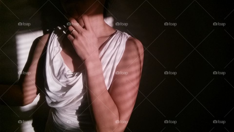 woman in shadow and light