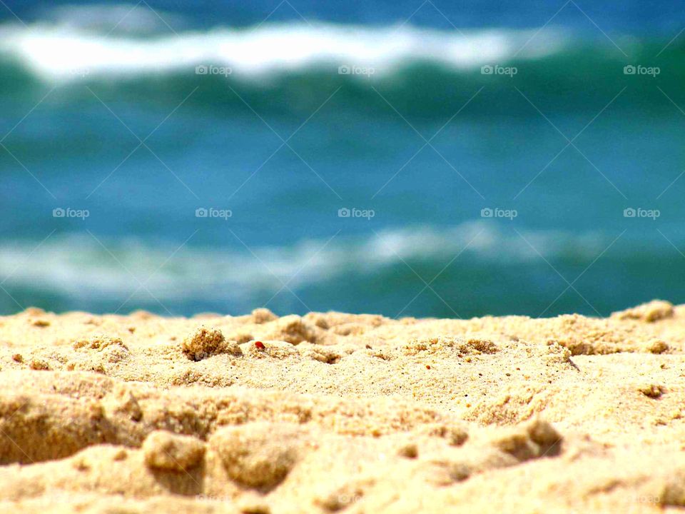 Beach sand sea ocean blue water advertisement adventure