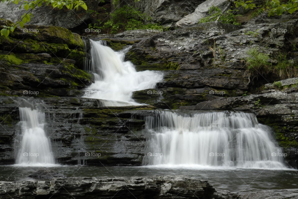 Water in motion, rushing water fall