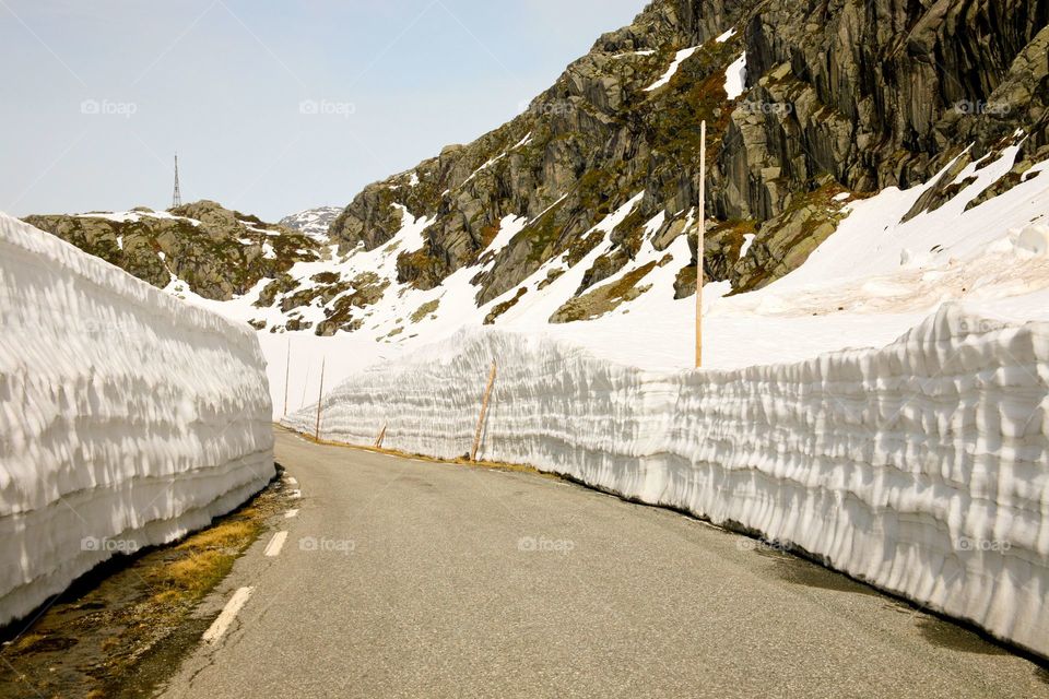 Walls of snow along the road. 