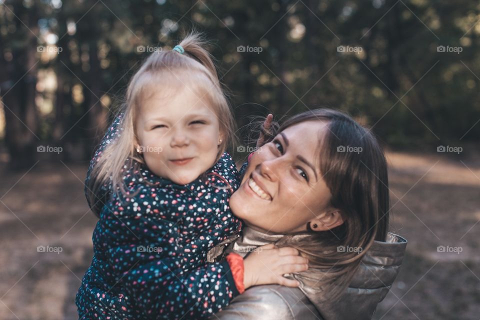 happy mom and daughter