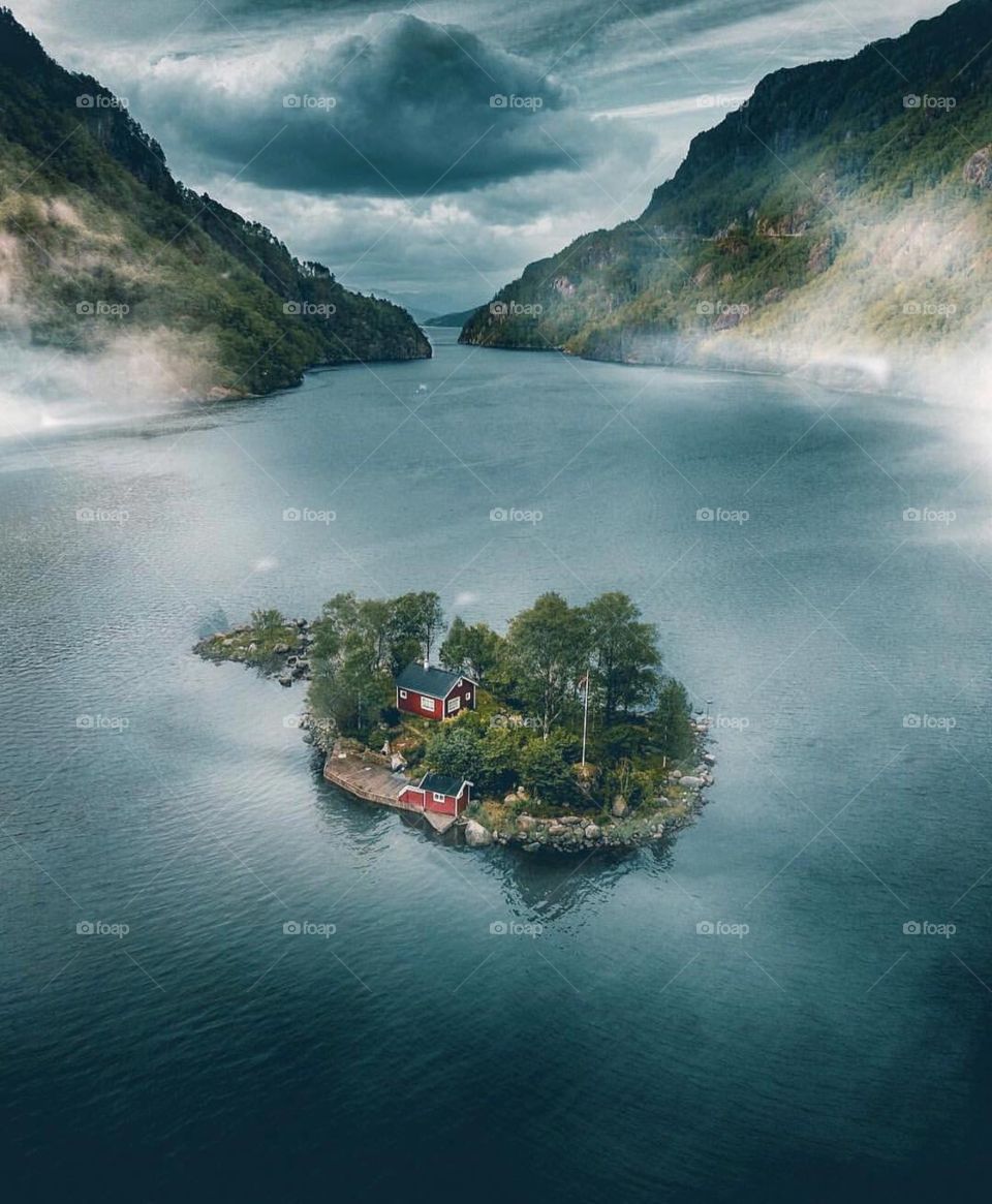 Beautiful island in the midst of the lake in Norway 