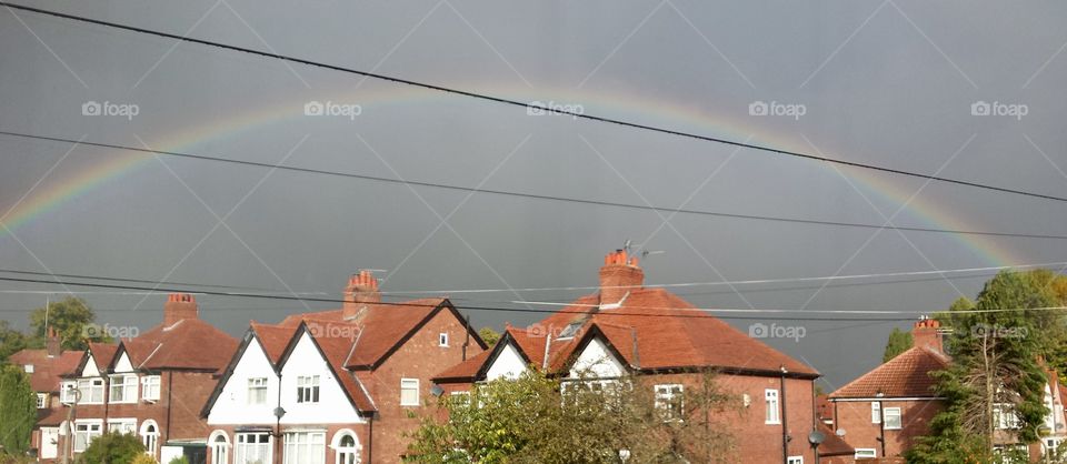 Beautiful rainbow against a moody grey sky