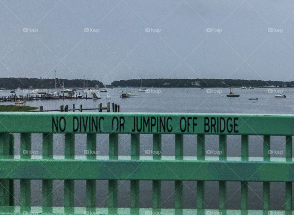 No diving nor jumping off bridge!!  This is a small bridge found in Cotuit, Cape Cod, MA 