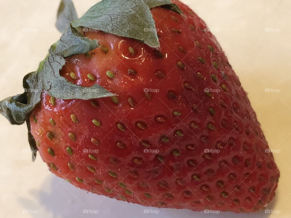 Strawberry about to be eaten