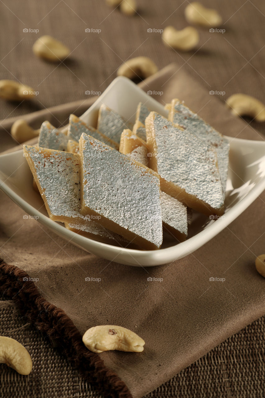 Indian sweet kaju Katli in a bowl