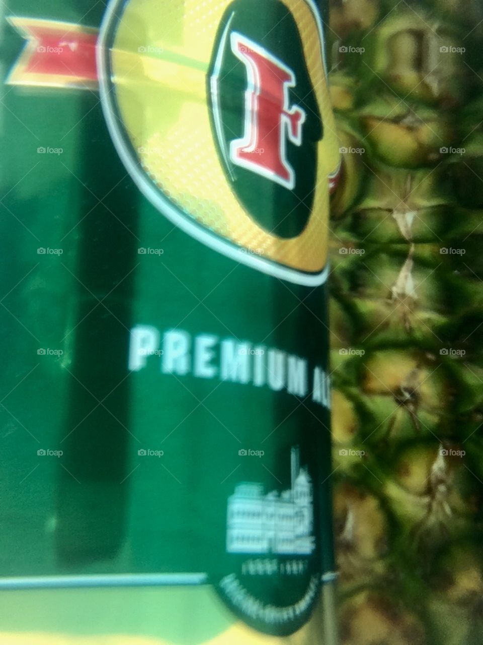 Fosters beer underwater with a pineapple 🍍