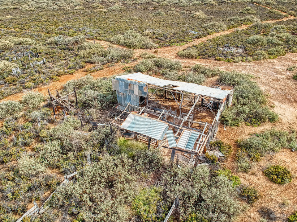 Abandoned shed with missing iron sheets