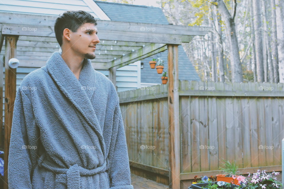 young man in robe